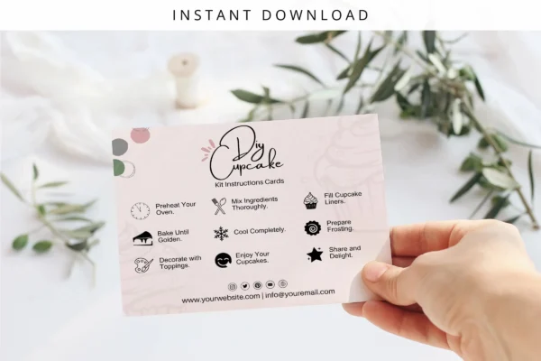 Diy Cupcake Kit Instructions Cards Cc 322 Feature Images 10 A pastel diy cupcake instruction card held in hand with a minimalist background and greenery accents, showcasing its elegant design.