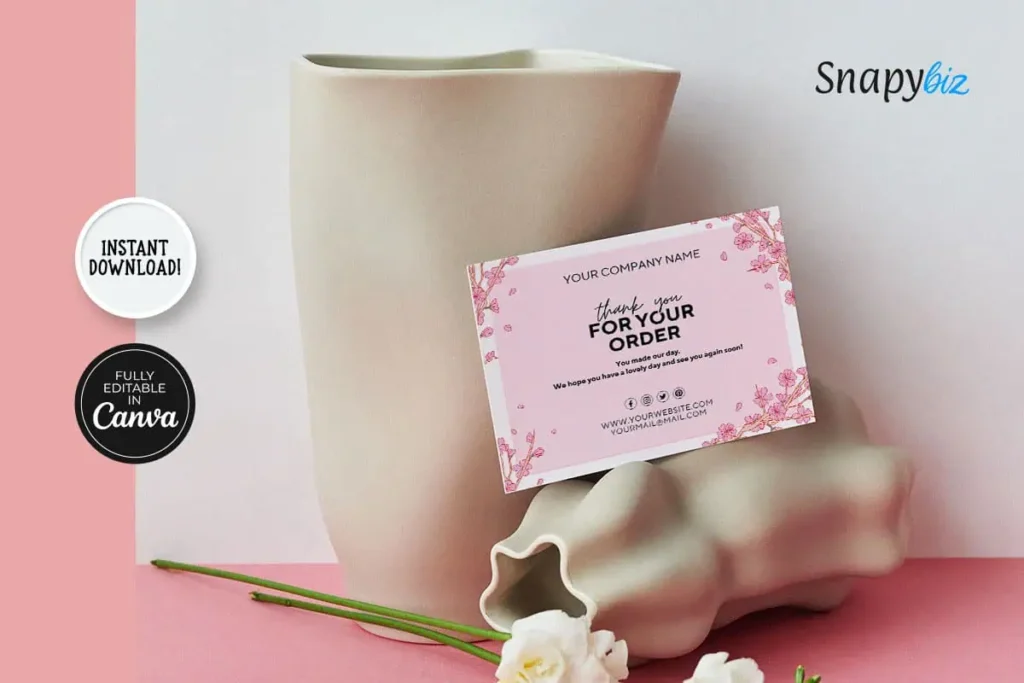 Pink-themed "Thank you for your order" card displayed in front of a stylish beige vase, emphasizing gratitude and personalized messaging.