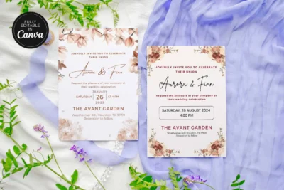 Two versions of a floral wedding invitation template displayed on a soft blue fabric with green leaves, enhancing the aesthetic appeal.