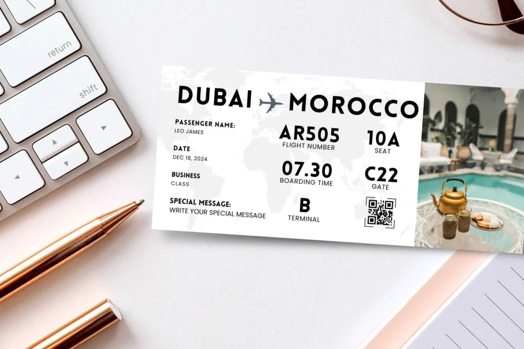 A pair of boarding passes displayed on a white wooden surface. One ticket is for a flight from Dubai to Morocco with a clean, modern design, and the other features a scenic image of a mosque near a waterfront. Both tickets highlight editable fields such as passenger name, flight details, and special message areas.