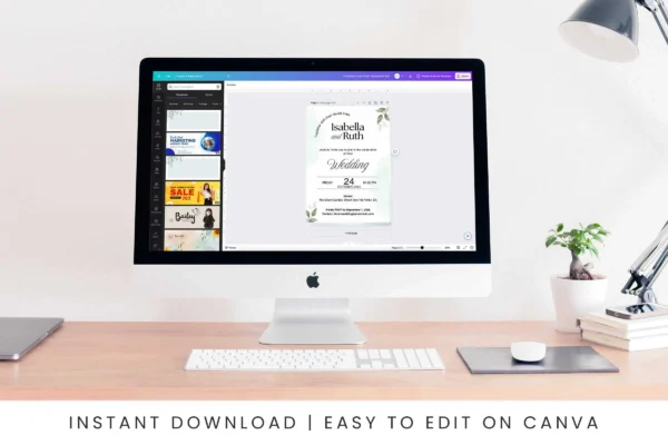 A desktop computer screen displaying a canva editing interface with a wedding invitation template, positioned on a neatly arranged wooden desk.