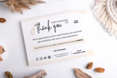 Single keychain business thank you card on a clean white background with rustic accents, emphasizing the customizable Canva template and connection details for small businesses.
